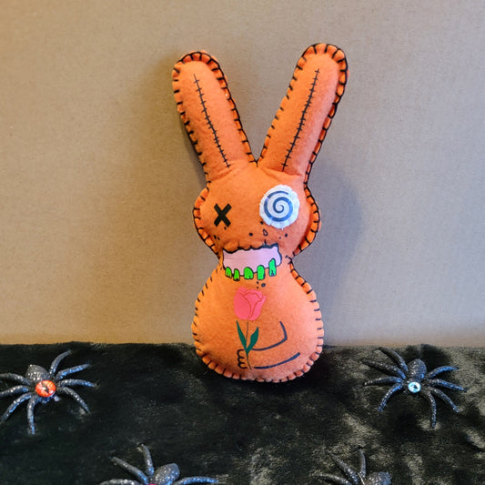 Orange Zombie Bunny with flowers holding a hammer behind his back- Made to order