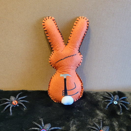 Orange Zombie Bunny with flowers holding a hammer behind his back- Made to order