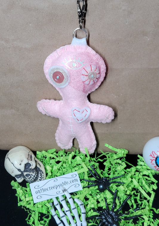 Baby pink Button-Eyed Stitchling felt plush keychain with metal keyring