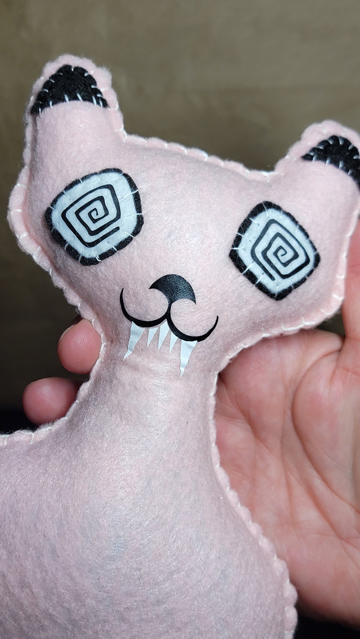 One-of-a-kind baby pink spooky cat plush collectible