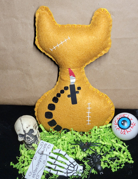 Creepy killer kitty horror plush shown at an angle