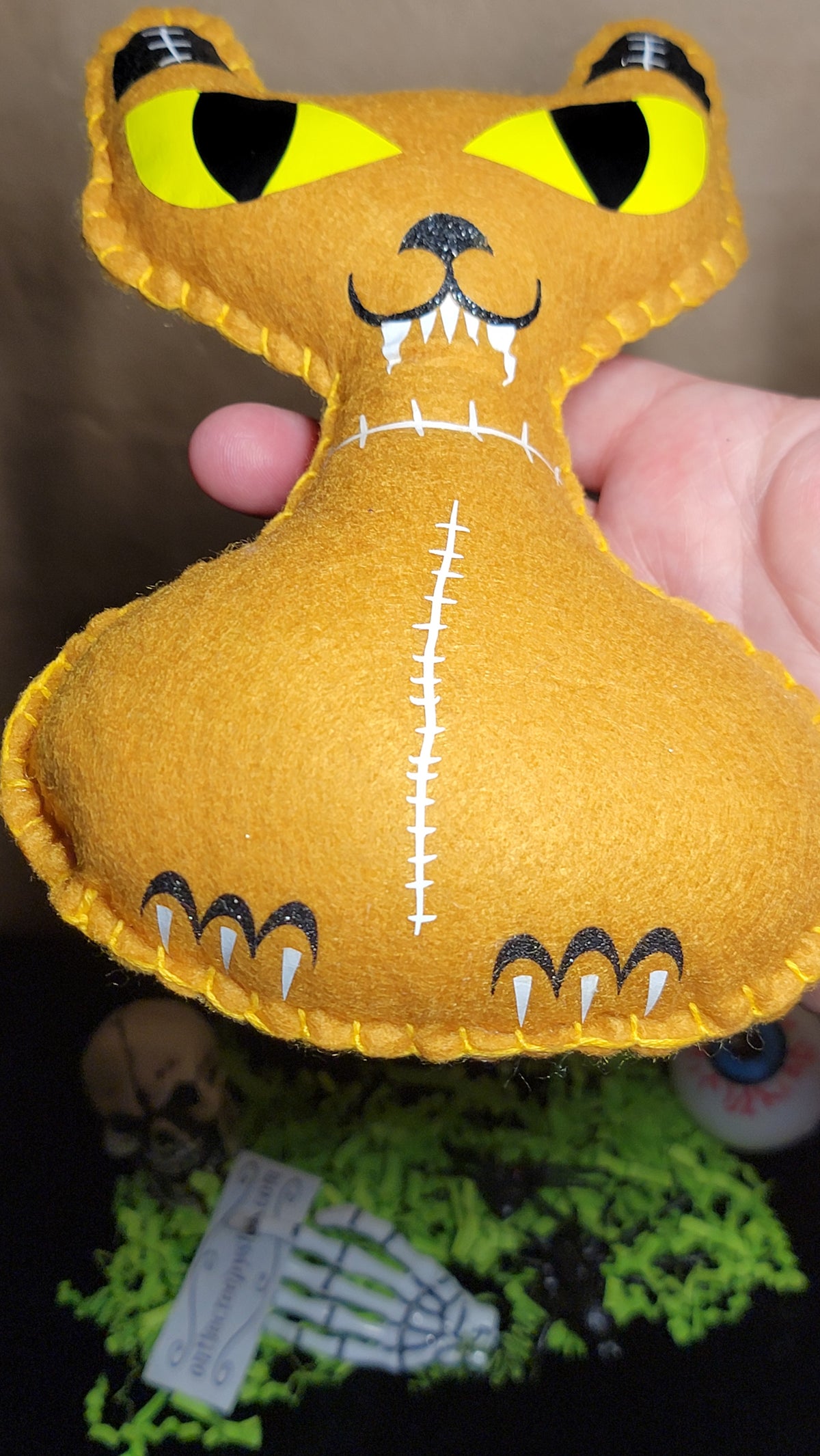 Handmade creepy cat plush details and stitching