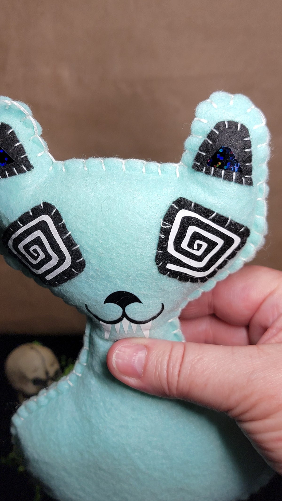 Handmade Hipno Killer Kitty plush in mint green felt