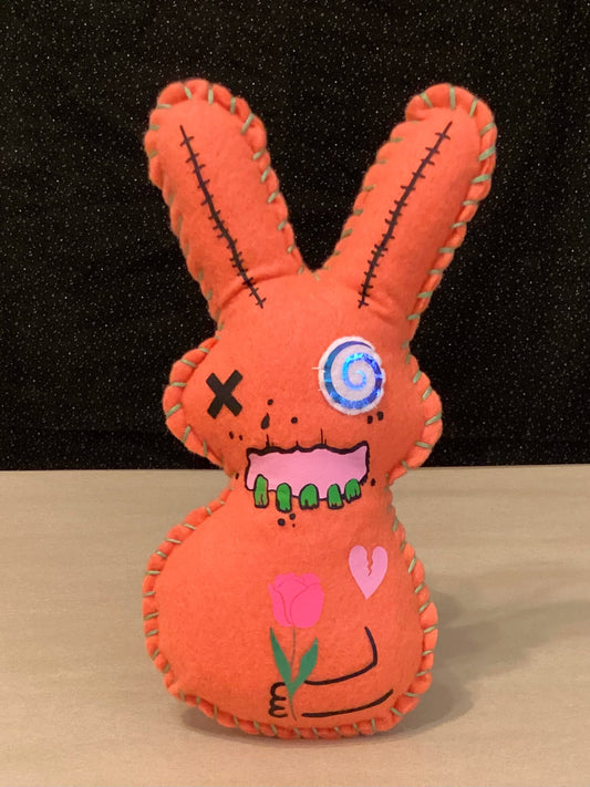 Orange Zombie Bunny with flowers holding a hammer behind his back- Made to order