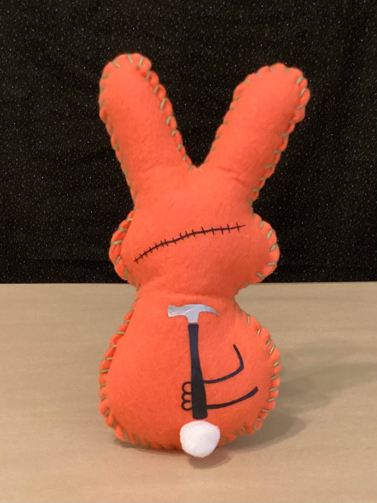 Orange Zombie Bunny with flowers holding a hammer behind his back- Made to order