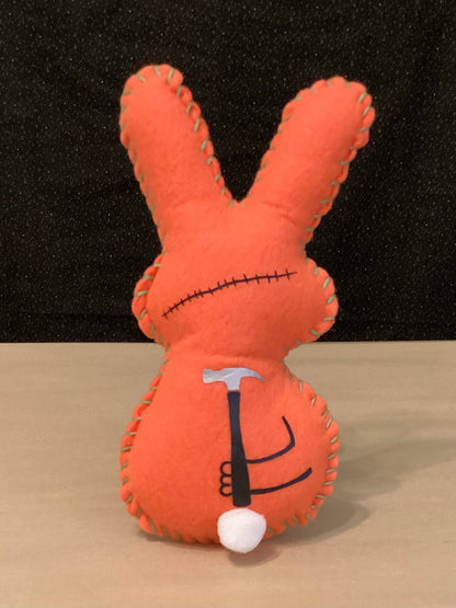 Orange Zombie Bunny with flowers holding a hammer behind his back- Made to order