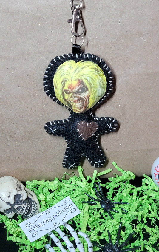 Front view of Mini Music Mascot Eddie Stitchling handmade black felt keychain with metal clip and stitched heart