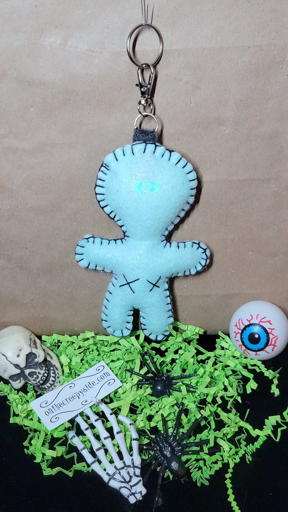 Mint green and grey Stitchling felt keychain and bag charm, ready to ship