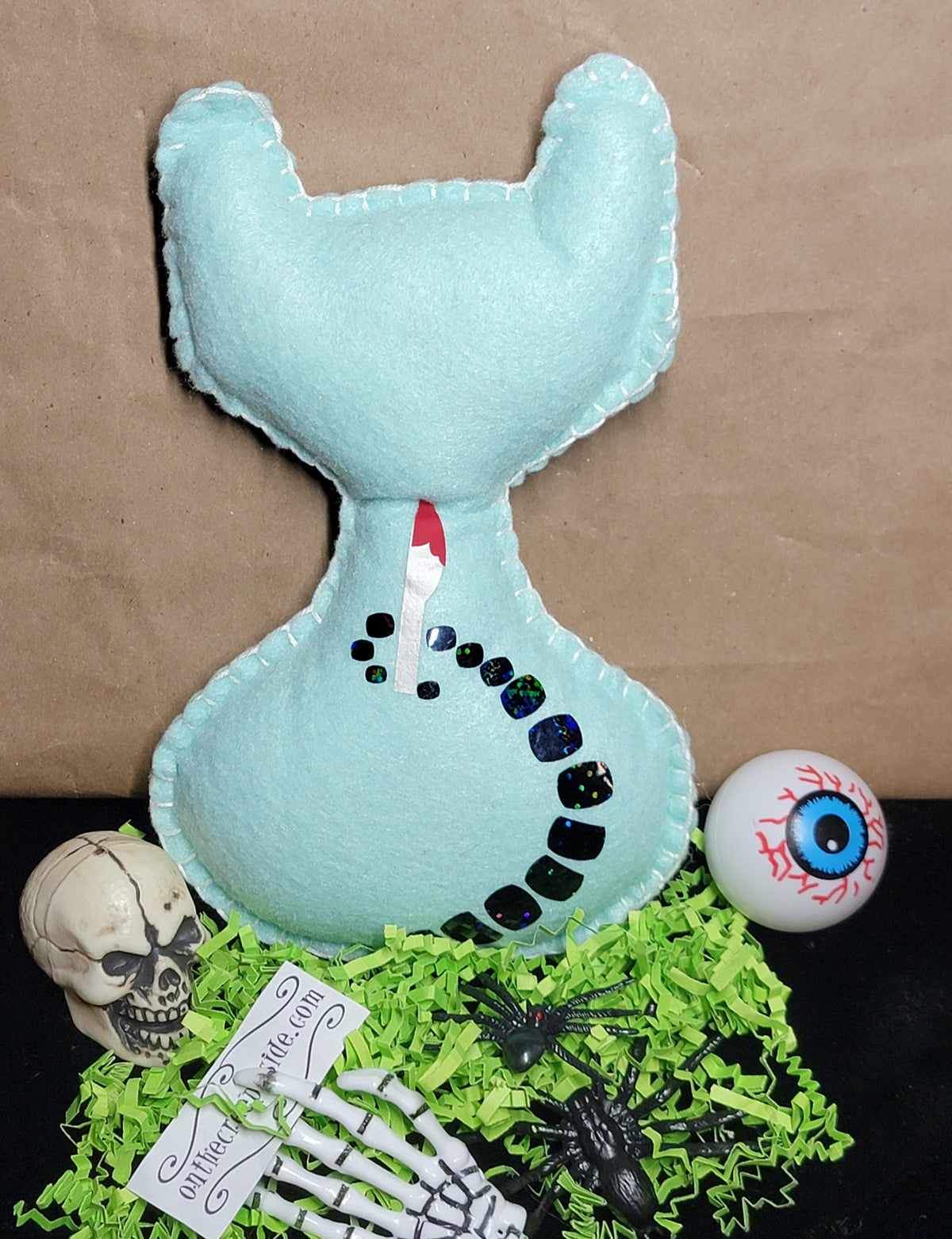 One-of-a-kind mint green spooky cat plush collectible