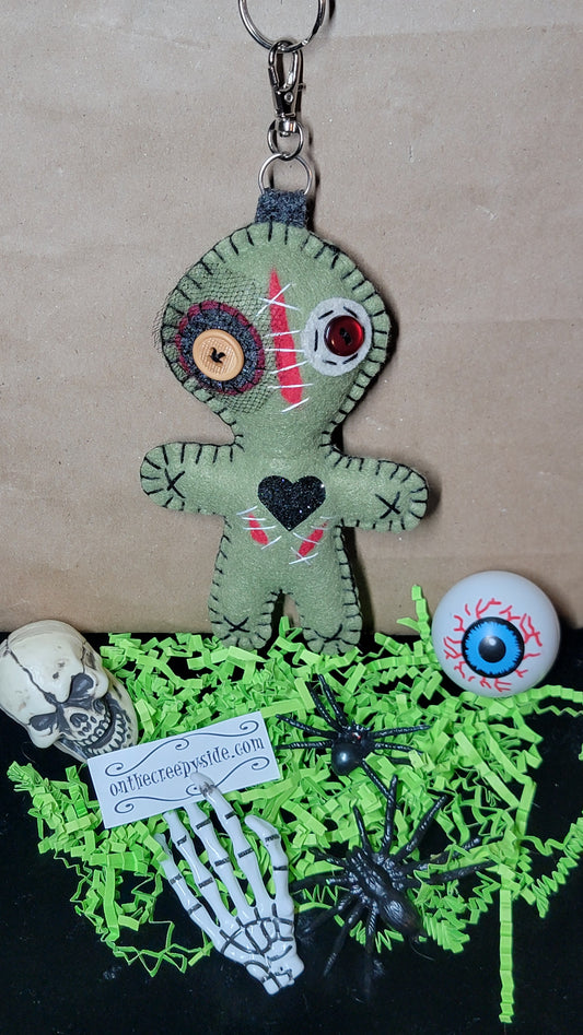 Olive green Button-Eyed Stitchling felt plush keychain with metal keyring