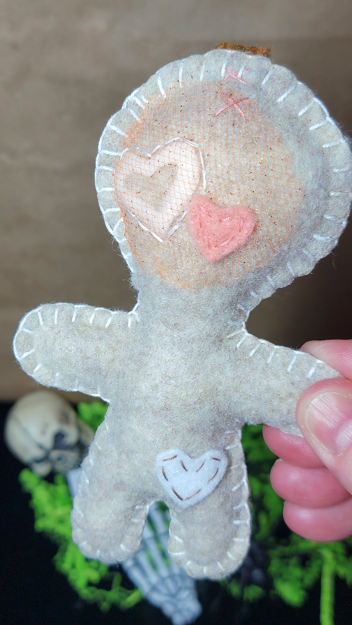 One-of-a-kind hand-stitched Button-Eyed Stitchling plush keychain