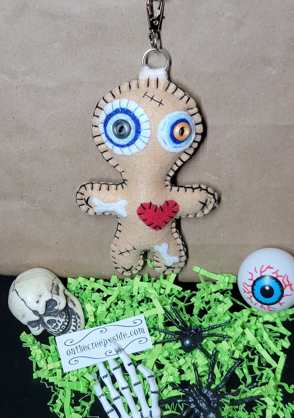 Button-Eyed Stitchling felt plush keychain with red heart and metal keyring