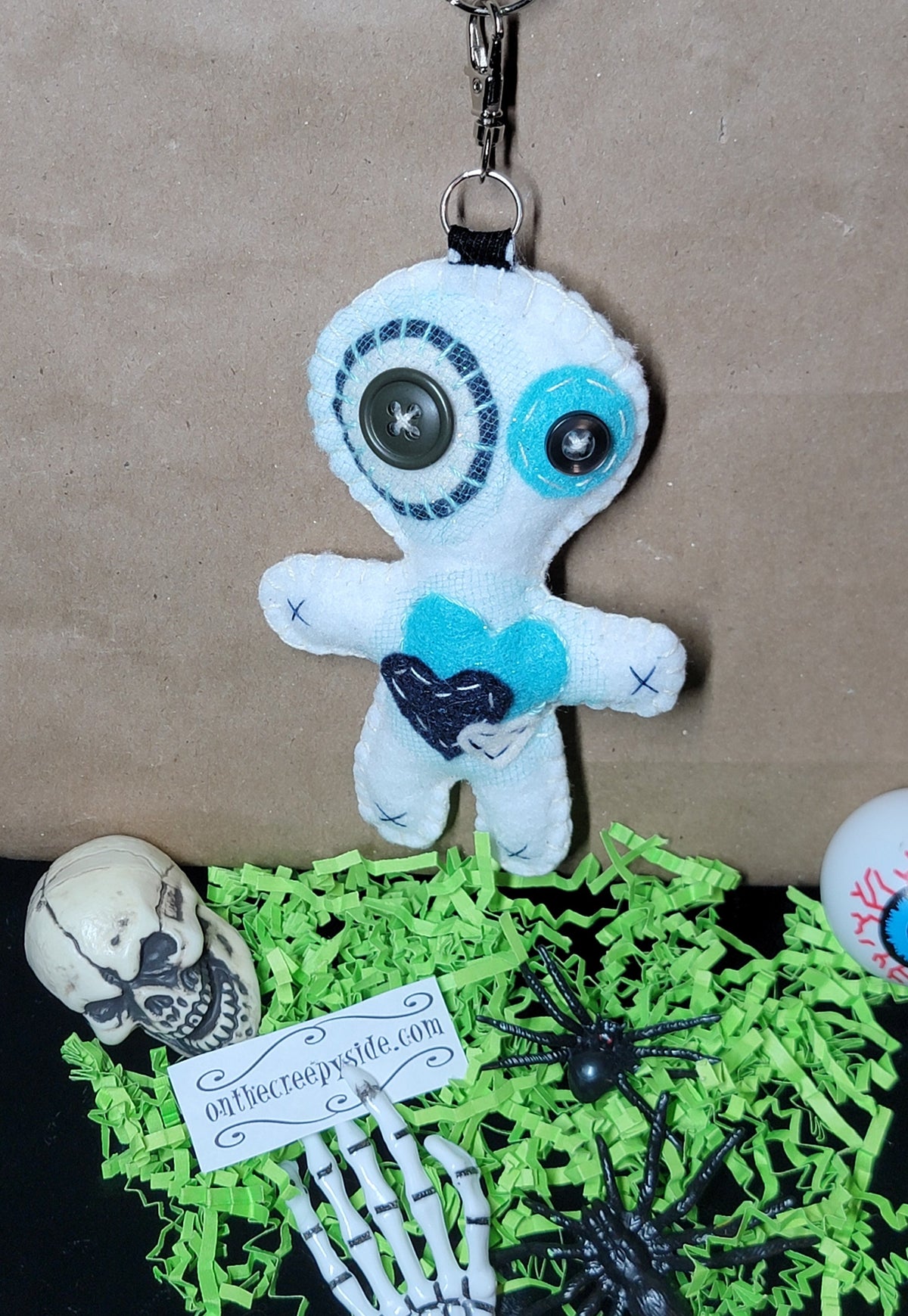 White Button-Eyed Stitchling felt plush keychain with metal keyring