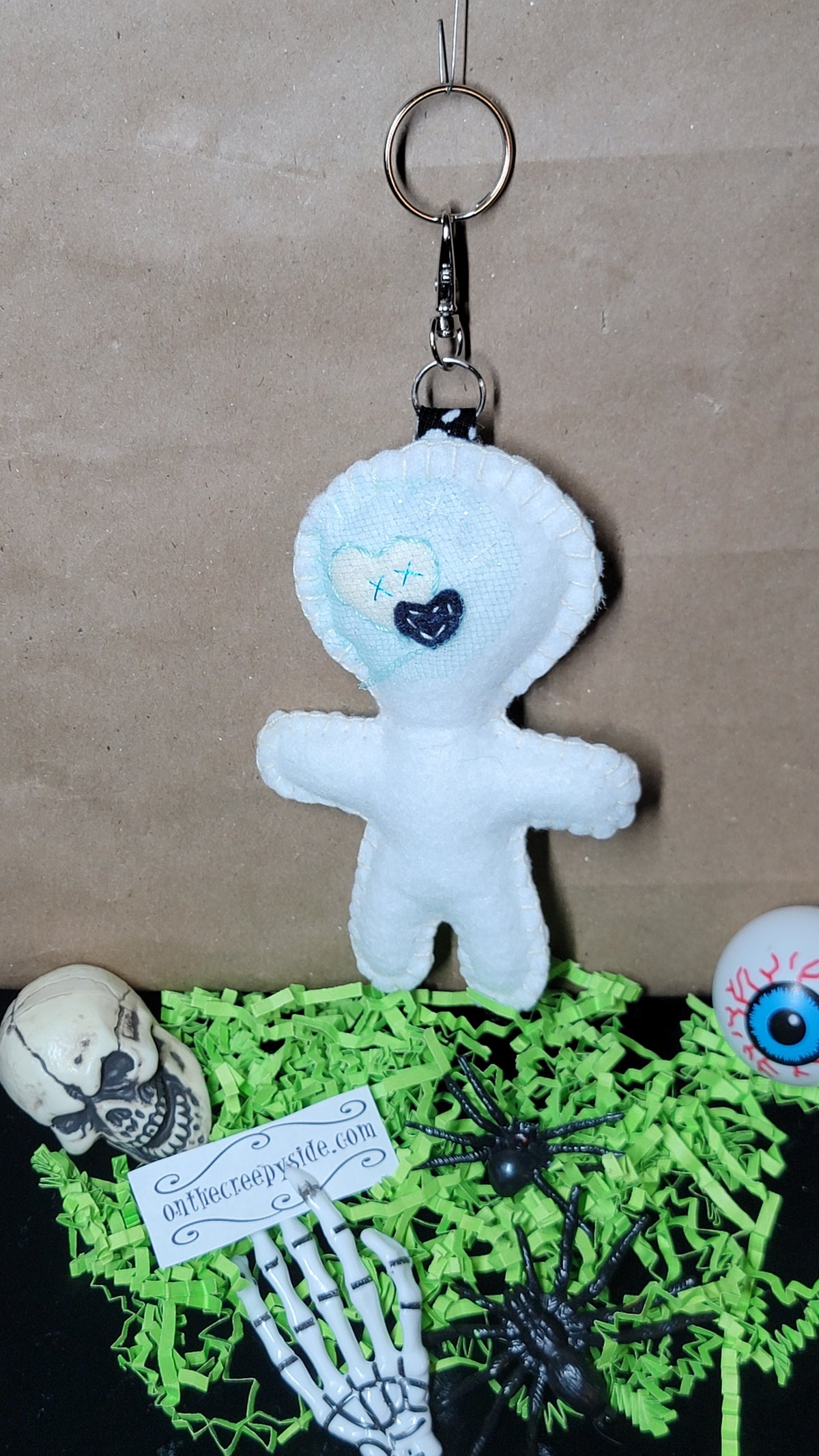 White Button-Eyed Stitchling felt keychain and bag charm, ready to ship
