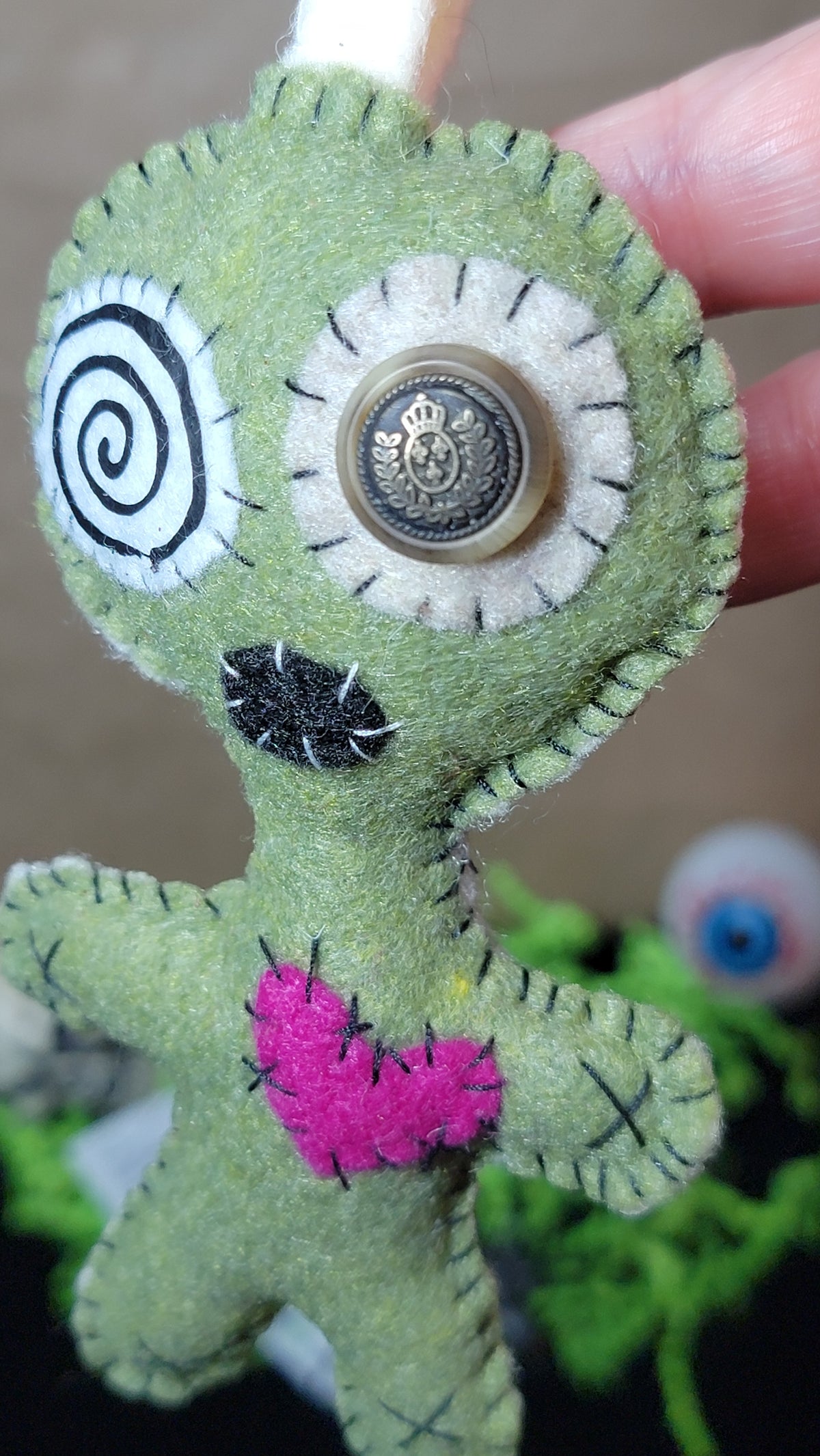 Olive green Mini Button-Eyed Stitchling felt plush keychain with metal keyring