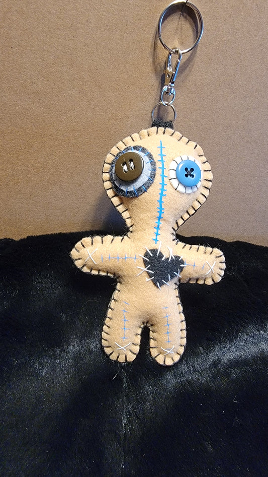 Hand-stitched felt Button-Eyed Stitchling plush keychain with metal keyring